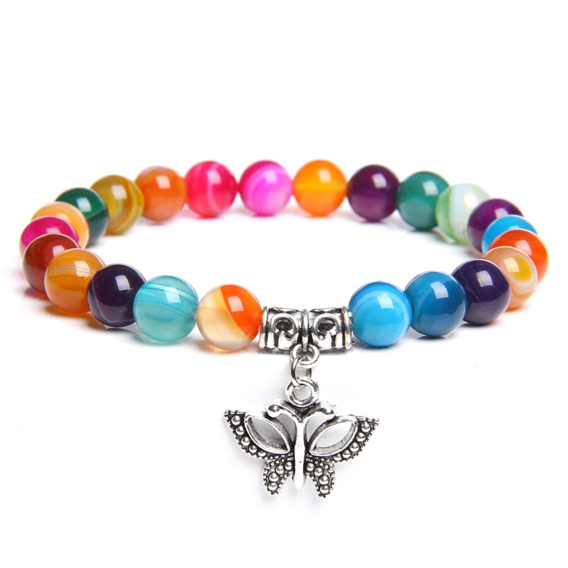 Ladies blue amazonite beaded bracelet with a metal elephant charm.