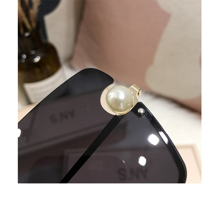 Ladies Rimless Sunglasses UV400 pearl.