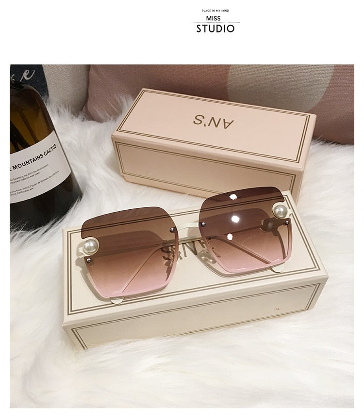 Ladies Rimless Sunglasses UV400 pearl.