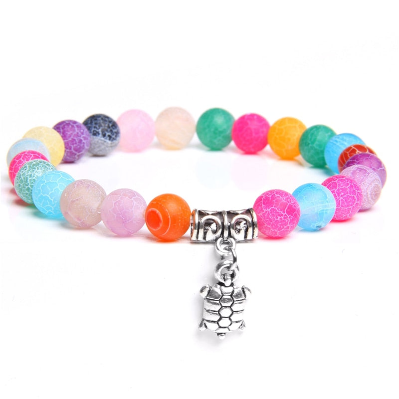 Ladies blue amazonite beaded bracelet with a metal elephant charm.