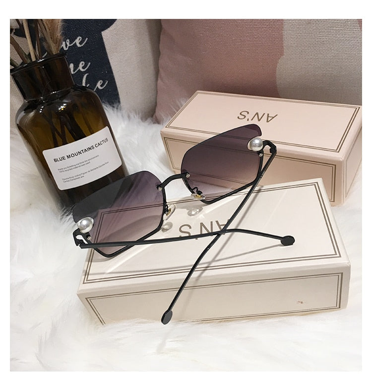 Ladies Rimless Sunglasses UV400 pearl.