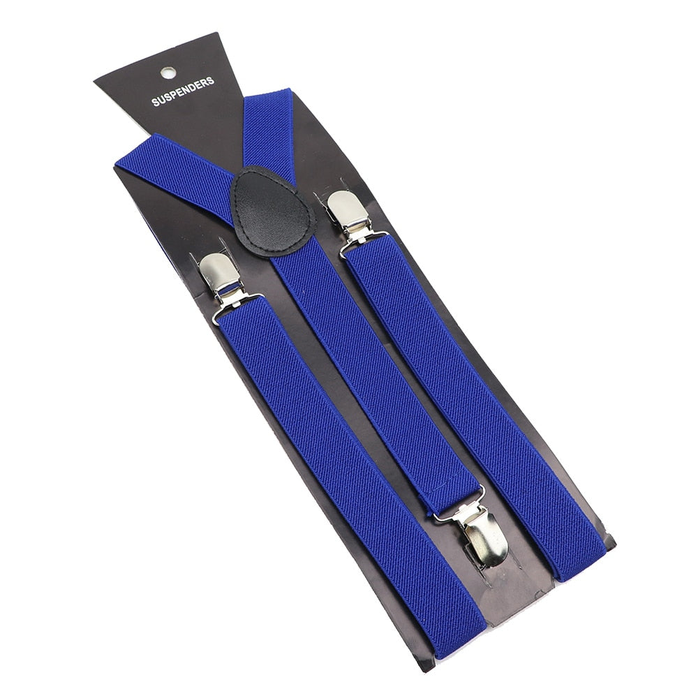 Leather Suspenders With Elastic Adjustable Straps. Comes in a variety of solid Colors.