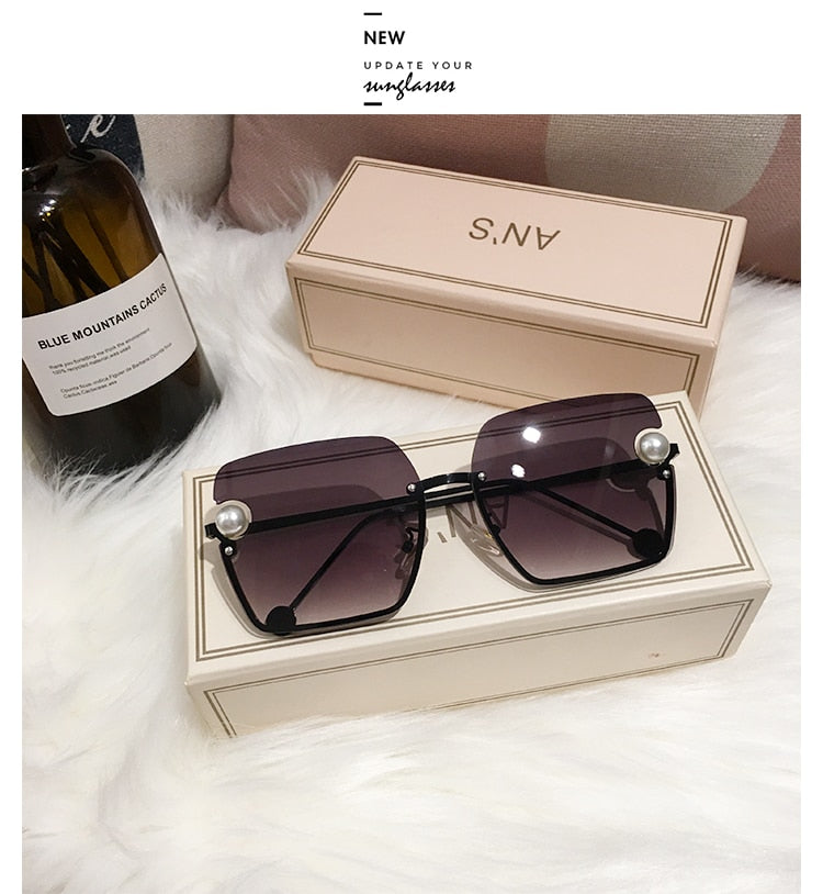 Ladies Rimless Sunglasses UV400 pearl.