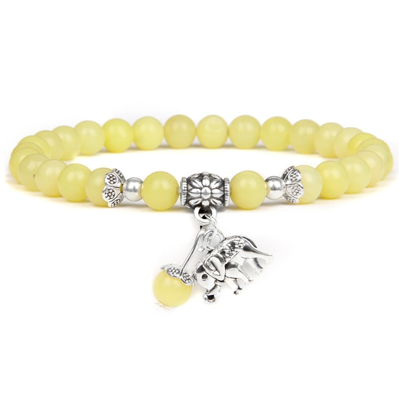 Ladies blue amazonite beaded bracelet with a metal elephant charm.