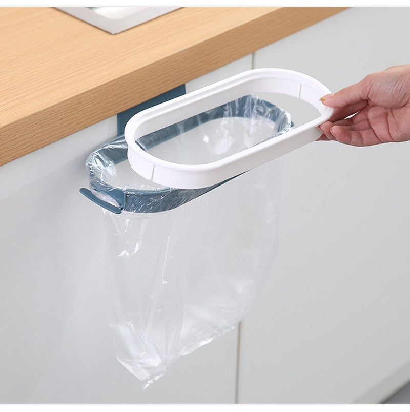 Kitchen Garbage Bag Rack that hangs on the front or back of the cupboard door. Great for quick access
