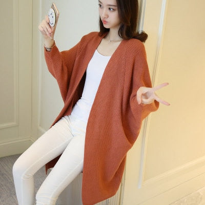 Ladies Long Knitted, bat sleeve Sweater.