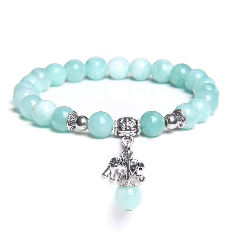 Ladies blue amazonite beaded bracelet with a metal elephant charm.