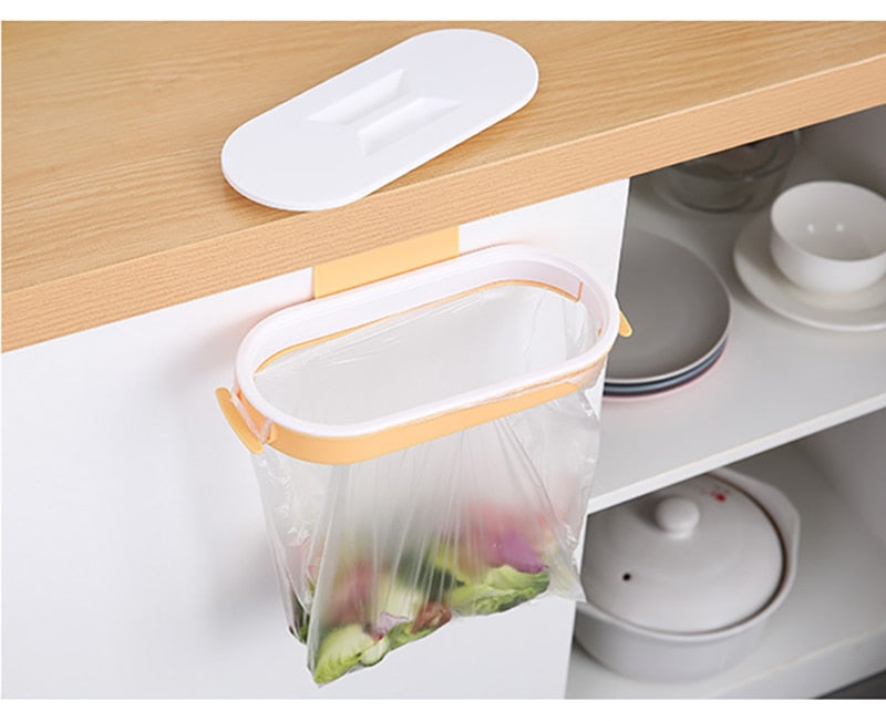 Kitchen Garbage Bag Rack that hangs on the front or back of the cupboard door. Great for quick access