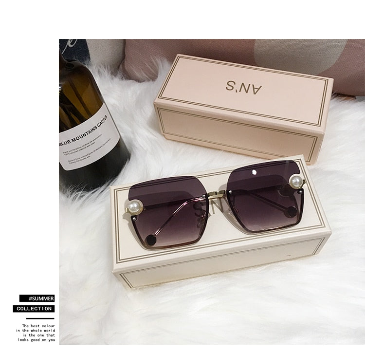 Ladies Rimless Sunglasses UV400 pearl.
