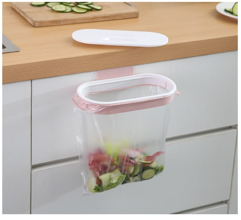 Kitchen Garbage Bag Rack that hangs on the front or back of the cupboard door. Great for quick access