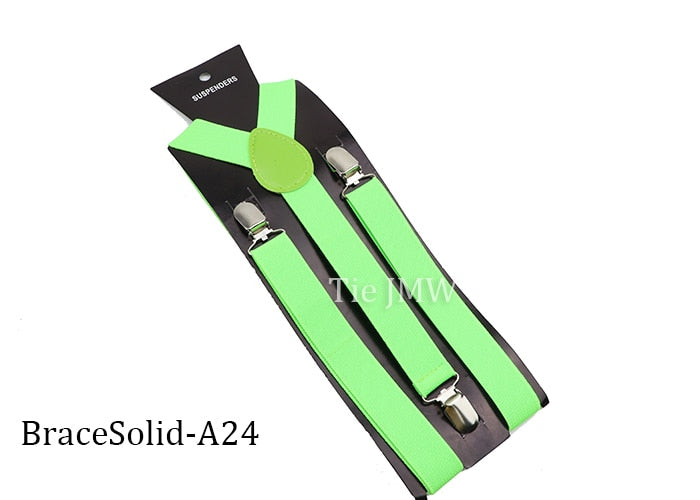 Leather Suspenders With Elastic Adjustable Straps. Comes in a variety of solid Colors.