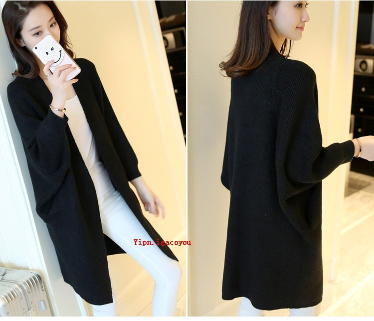 Ladies Long Knitted, bat sleeve Sweater.