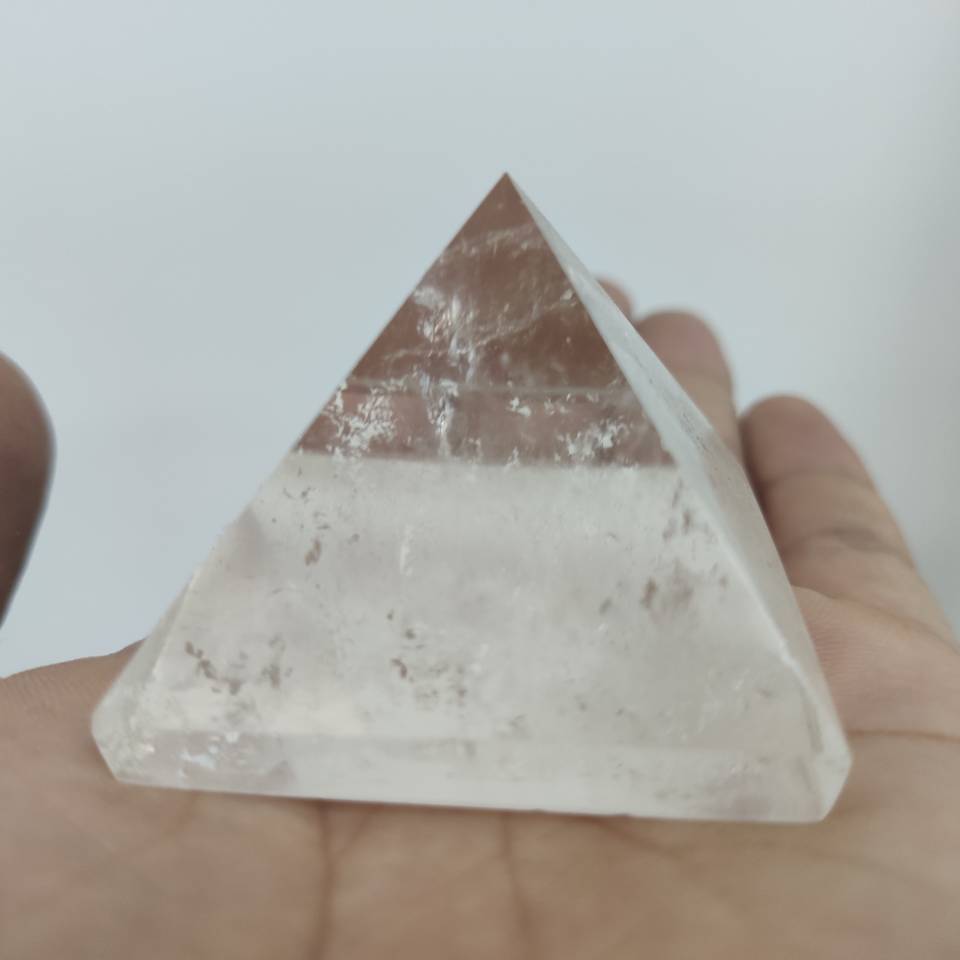 Natural Transparent Quartz Reiki Pyramid Healing crystal.