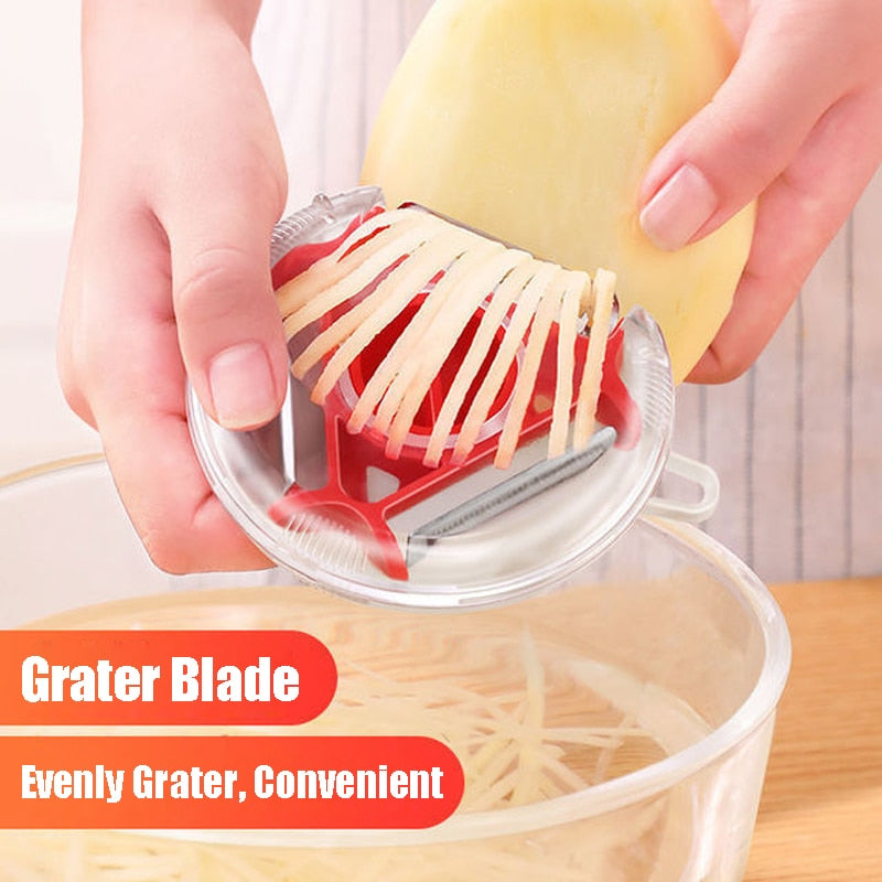 Trio Stainless Steel Blade Peeler/Slicer And Shredder.