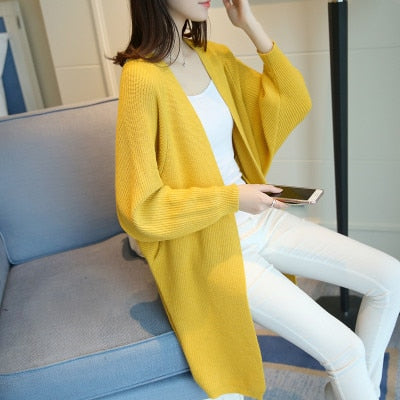Ladies Long Knitted, bat sleeve Sweater.