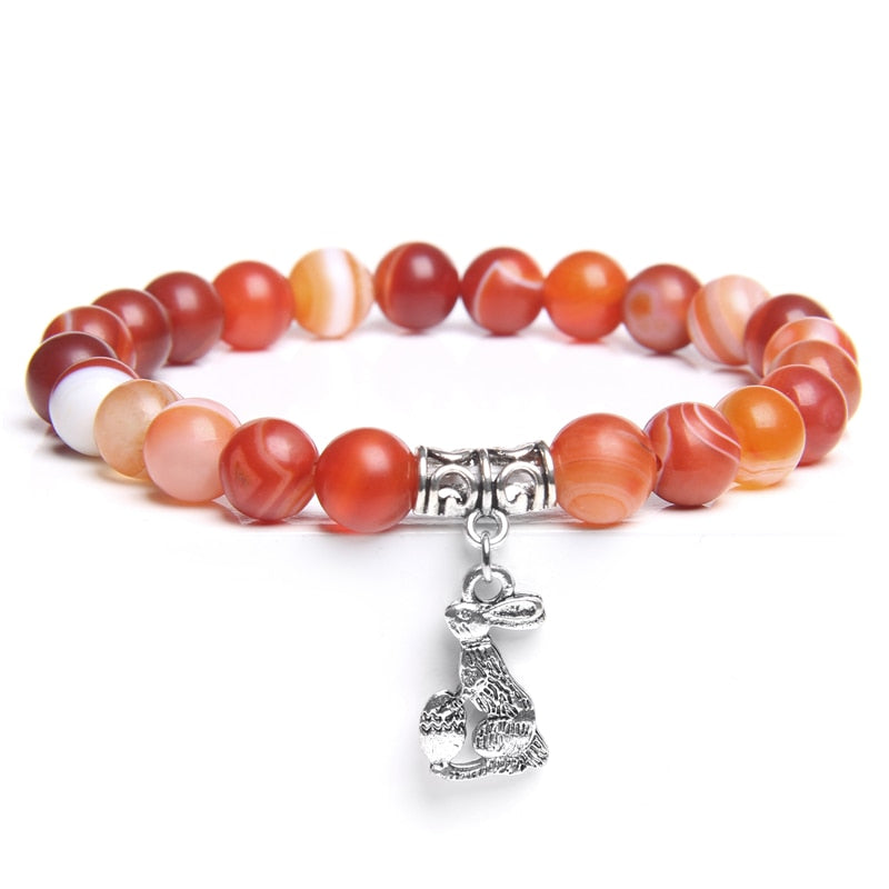 Ladies blue amazonite beaded bracelet with a metal elephant charm.