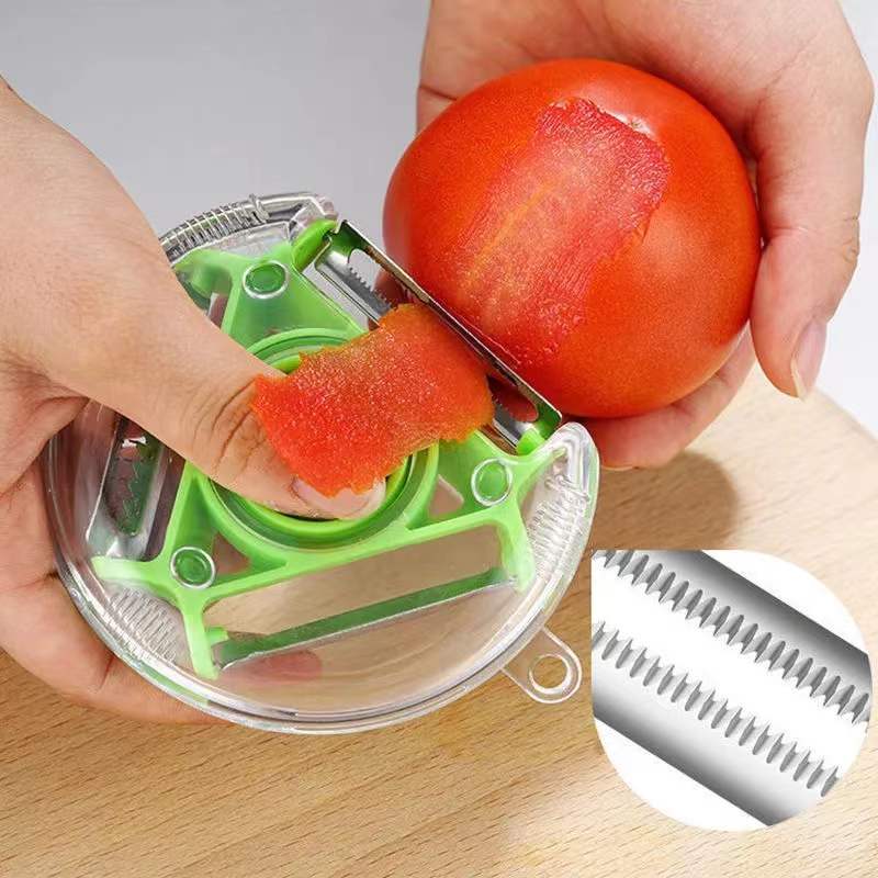 Trio Stainless Steel Blade Peeler/Slicer And Shredder.