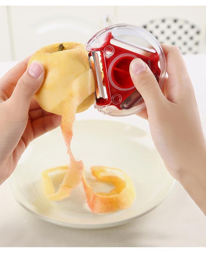 Trio Stainless Steel Blade Peeler/Slicer And Shredder.