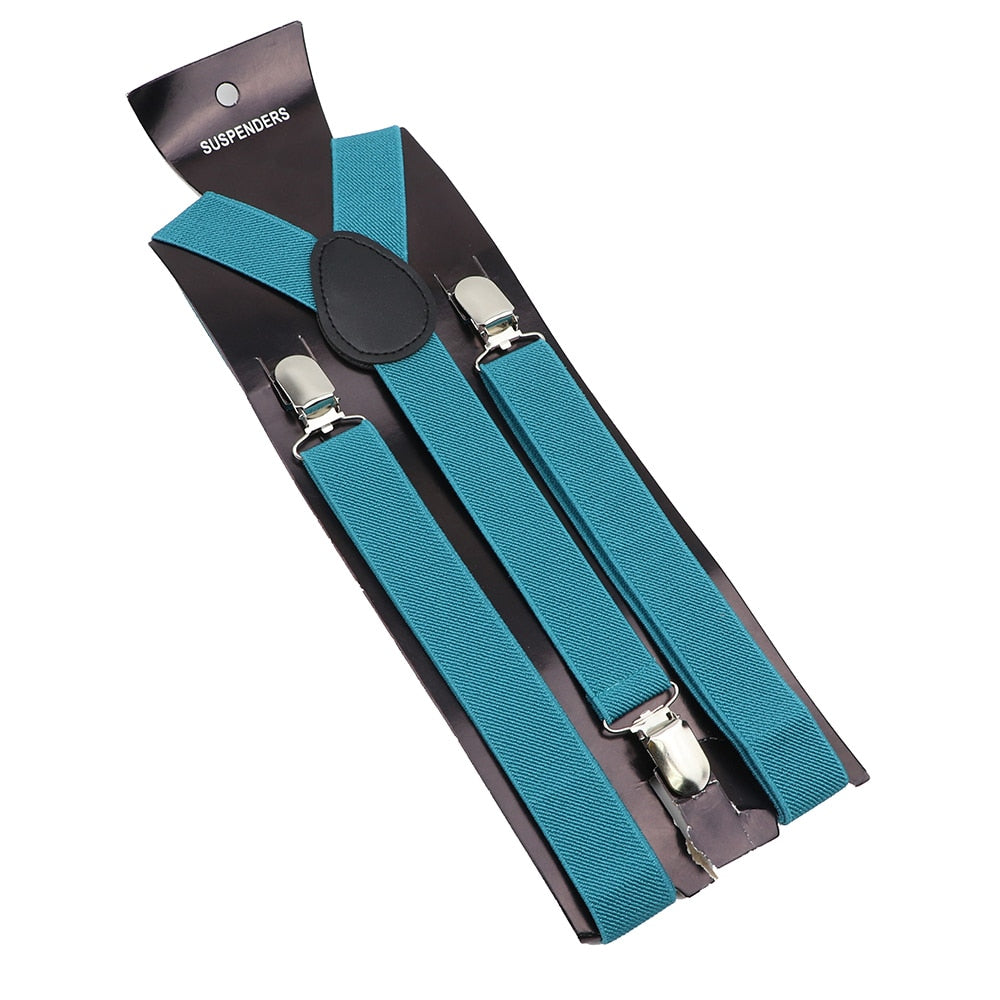 Leather Suspenders With Elastic Adjustable Straps. Comes in a variety of solid Colors.