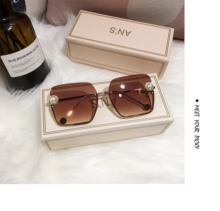 Ladies Rimless Sunglasses UV400 pearl.