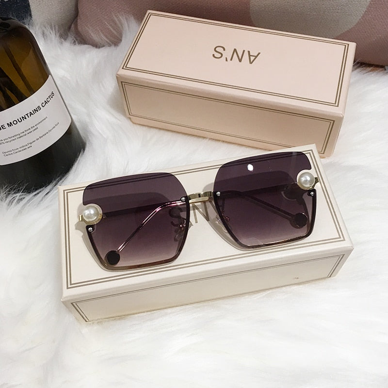 Ladies Rimless Sunglasses UV400 pearl.