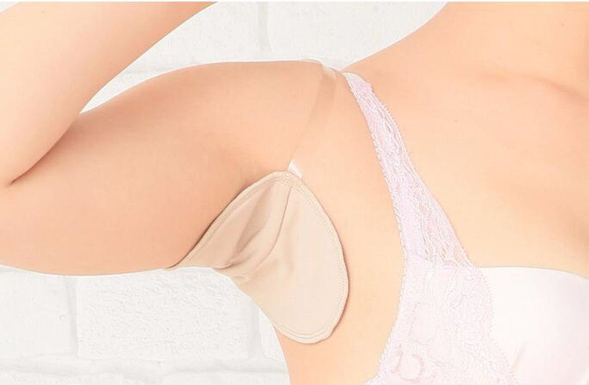 Perspiration Pads that attach over your shoulder. Absorbing, Washable Shields to protect your best dress.