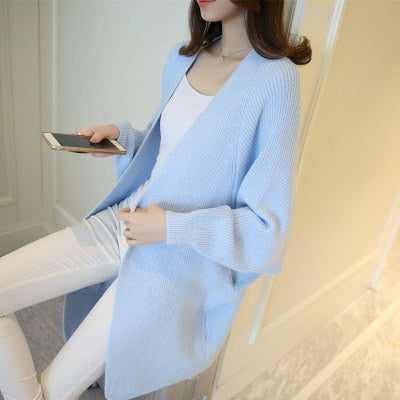 Ladies Long Knitted, bat sleeve Sweater.