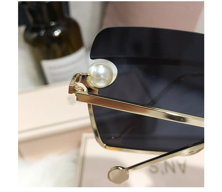 Ladies Rimless Sunglasses UV400 pearl.