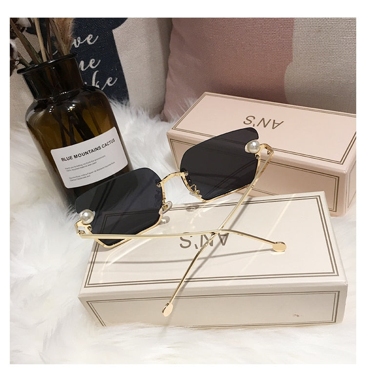 Ladies Rimless Sunglasses UV400 pearl.