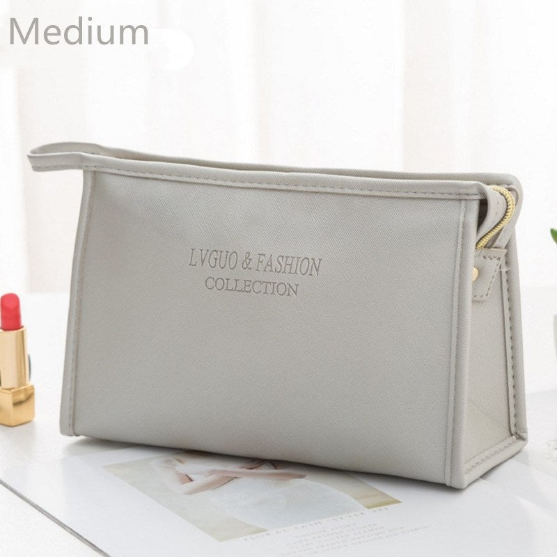 PURDORED 1 Pc women's Leather cosmetic Bag. Leather Waterproof Zipper Make Up organizer.