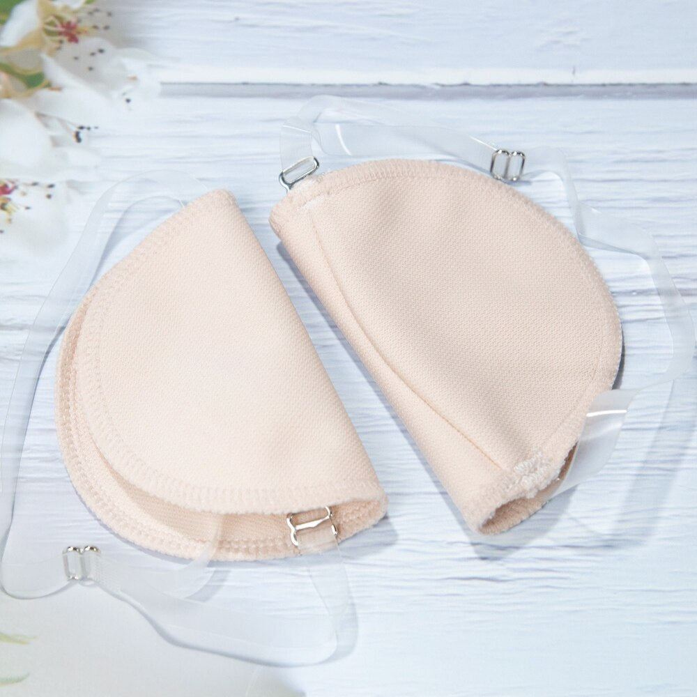 Perspiration Pads that attach over your shoulder. Absorbing, Washable Shields to protect your best dress.
