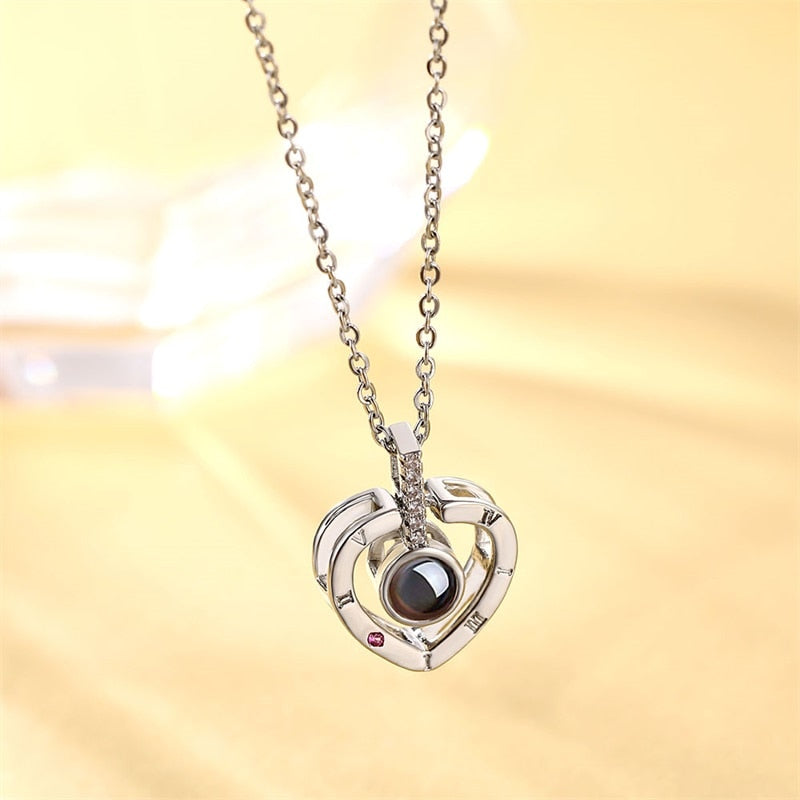 Necklace projects 100 different Languages saying "I Love You" .