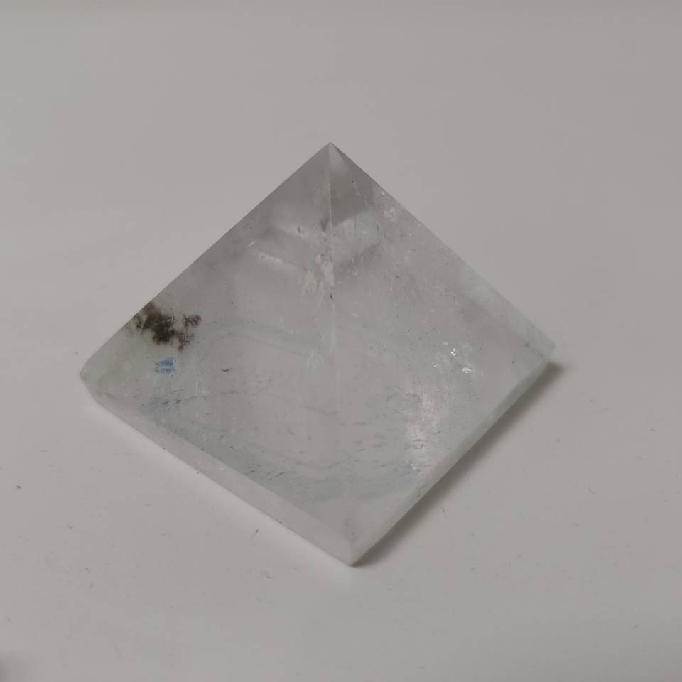Natural Transparent Quartz Reiki Pyramid Healing crystal.
