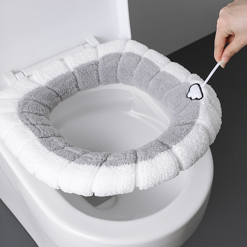 Universal Soft Warm Toilet Seat Cushion.  Easily removed and washable.