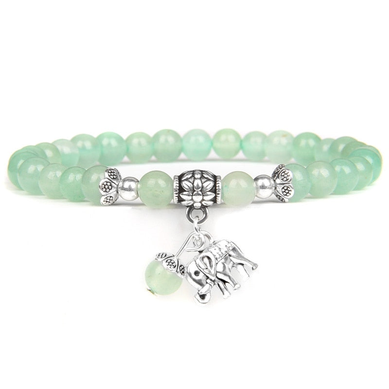 Ladies blue amazonite beaded bracelet with a metal elephant charm.