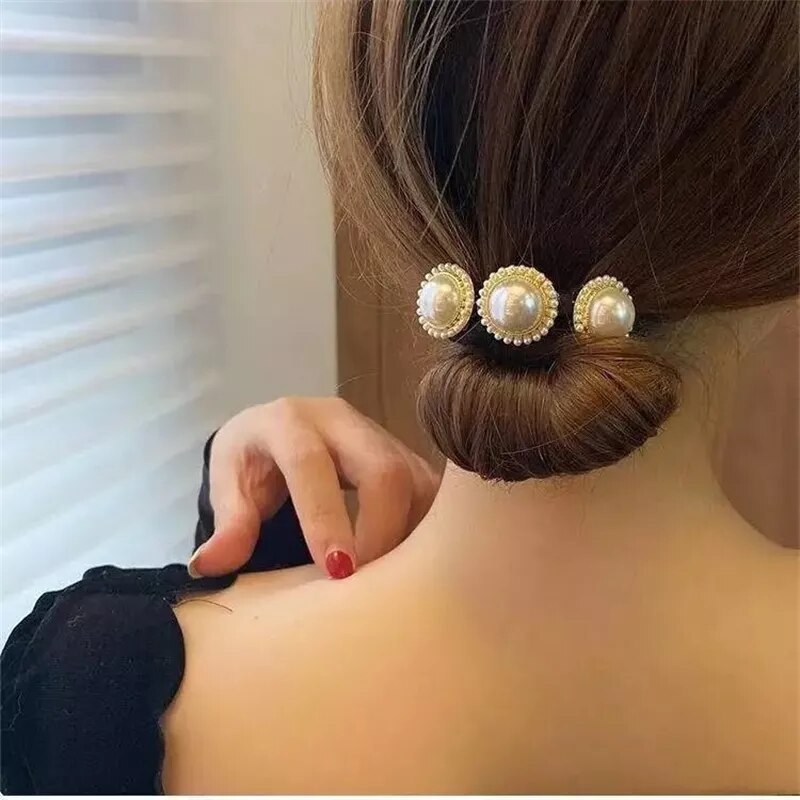 Pearl Ponytail Hair Twists To Make Elegant Buns.