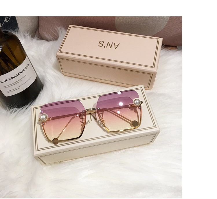 Ladies Rimless Sunglasses UV400 pearl.