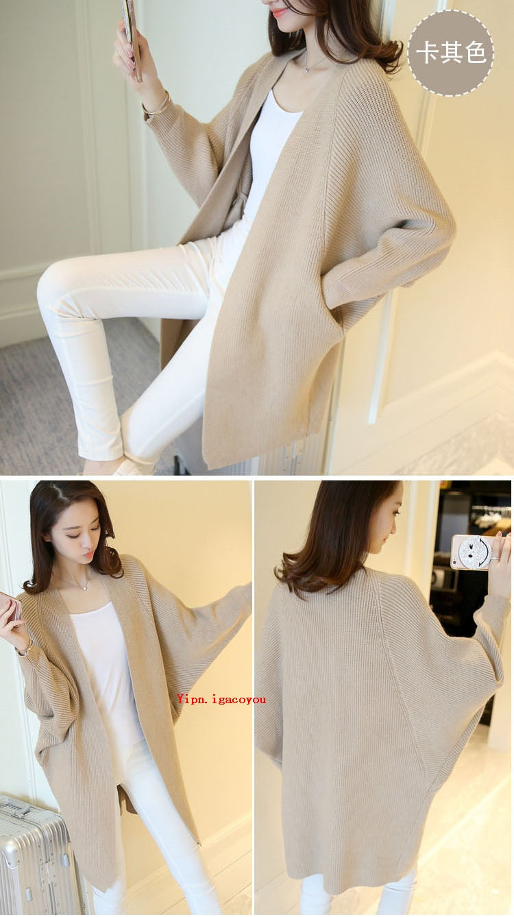 Ladies Long Knitted, bat sleeve Sweater.