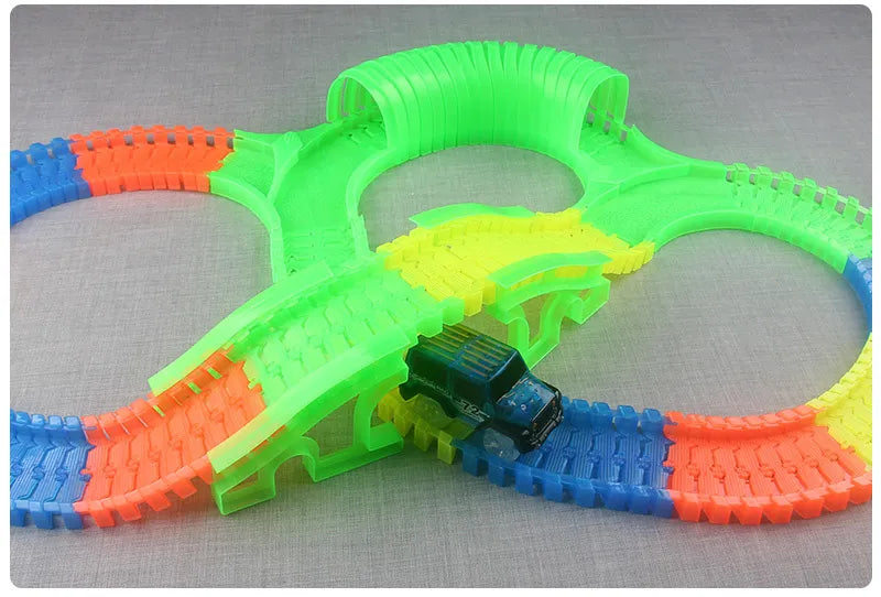 Flexible Glowing Race Track Set. Amount Of Pieces And Number Of Cars Vary.