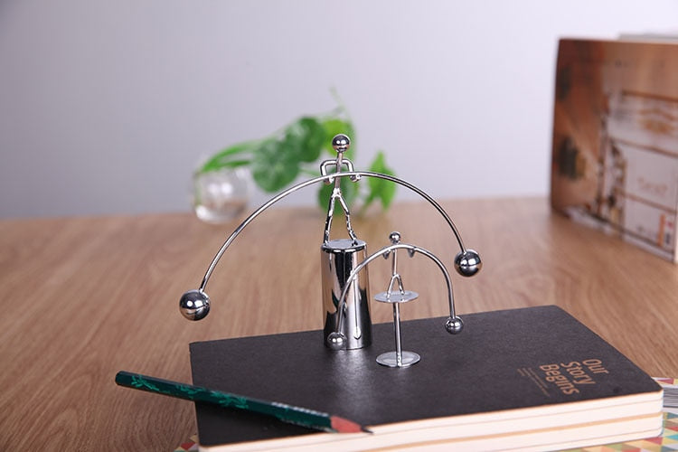 Newtons Cradle Steel Balance Ball for your desk or Children's Educational toy.