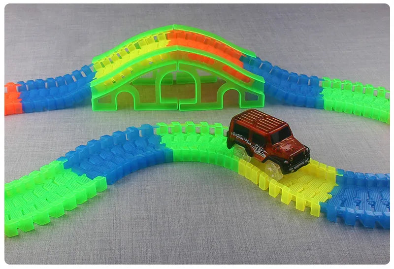 Flexible Glowing Race Track Set. Amount Of Pieces And Number Of Cars Vary.