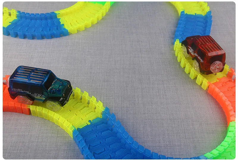 Flexible Glowing Race Track Set. Amount Of Pieces And Number Of Cars Vary.