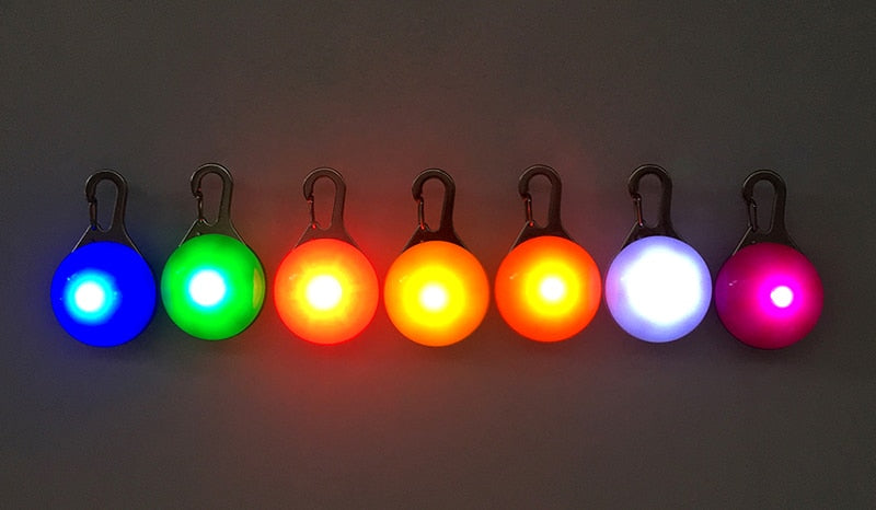 LED Night Safety Glowing Pendant That Clips on to Your Dogs Collar OR Can Clip on to Personal Key Chains.