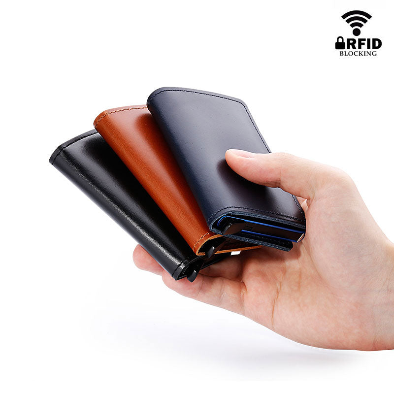 100% Genuine Leather Card Holder. RFID Protected 100% Genuine Leather. Metal side for credit cards to slide in.