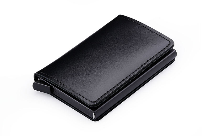 100% Genuine Leather Card Holder. RFID Protected 100% Genuine Leather. Metal side for credit cards to slide in.