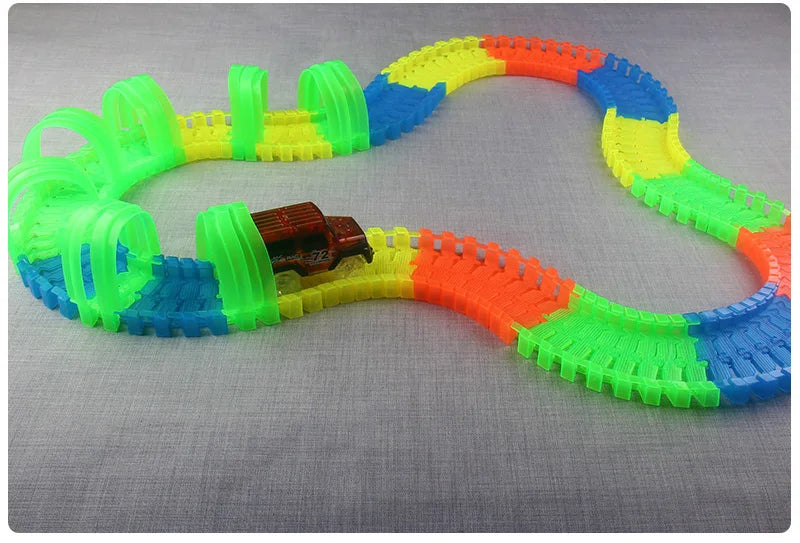 Flexible Glowing Race Track Set. Amount Of Pieces And Number Of Cars Vary.