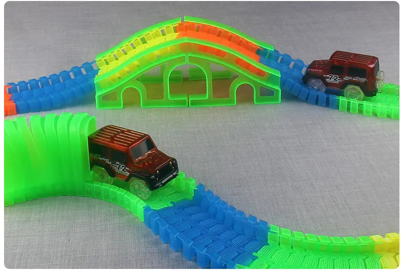 Flexible Glowing Race Track Set. Amount Of Pieces And Number Of Cars Vary.
