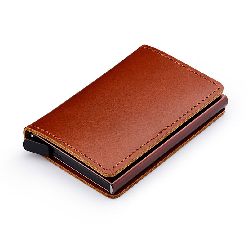 100% Genuine Leather Card Holder. RFID Protected 100% Genuine Leather. Metal side for credit cards to slide in.