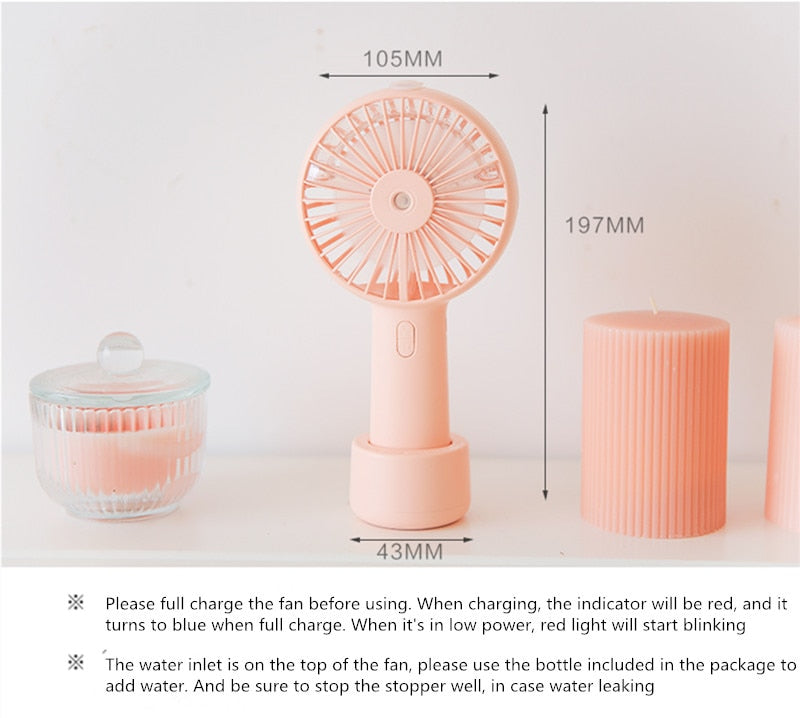 USB Rechargeable Handheld Mini cooling fan with water spray mist.