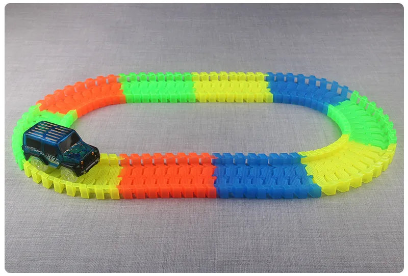 Flexible Glowing Race Track Set. Amount Of Pieces And Number Of Cars Vary.
